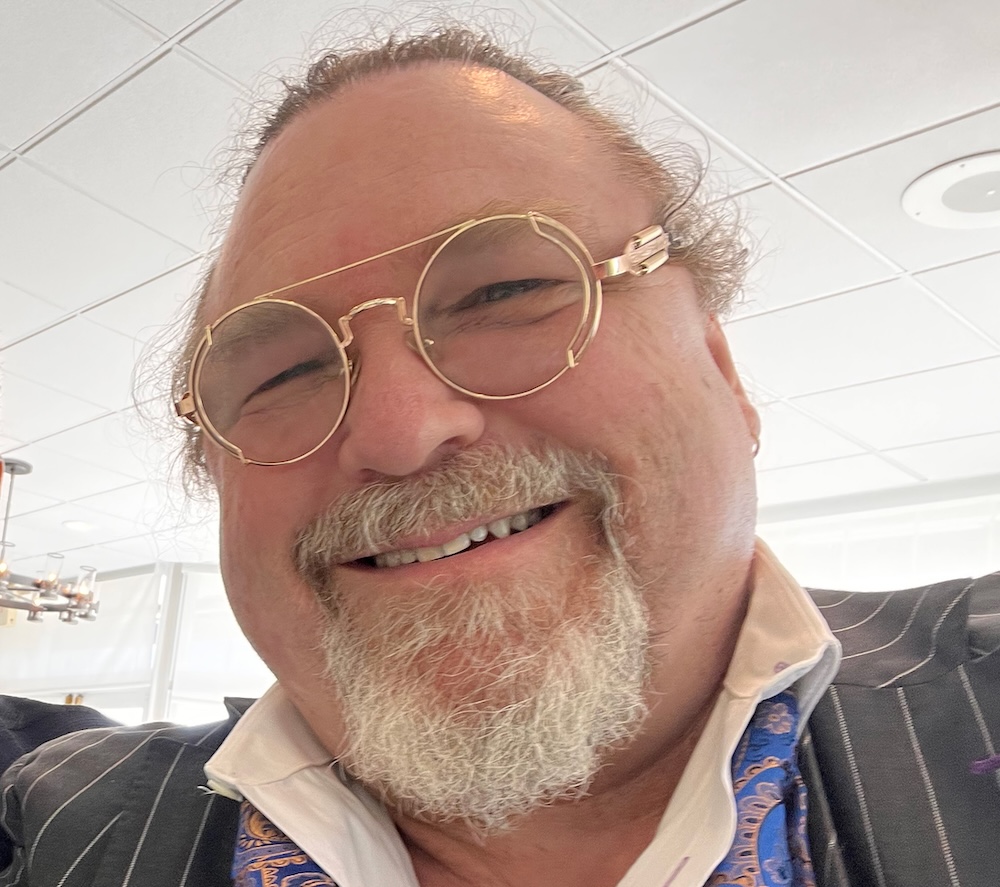 Dr. Simon E. Mills